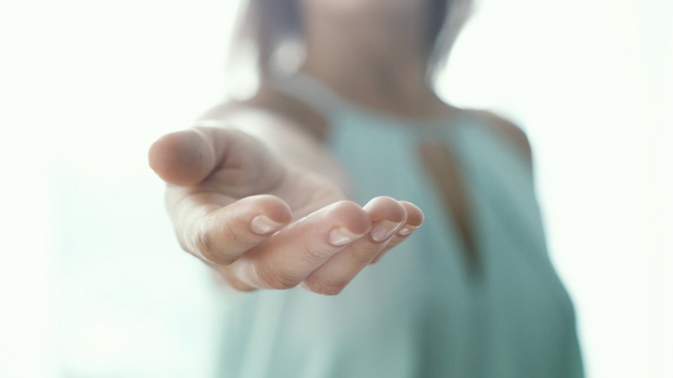Inviting invitation Gesture lends a helping hand by young woman